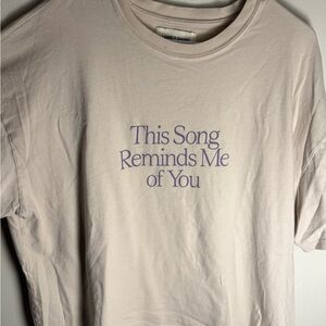 Lonely Ghost Cream Tee with Purple Text